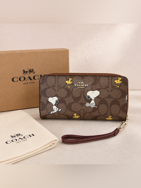 Coach Handbags - Coach Brown Signature Snoopy & Woodstock Zip Wristlet with Maroon Strap